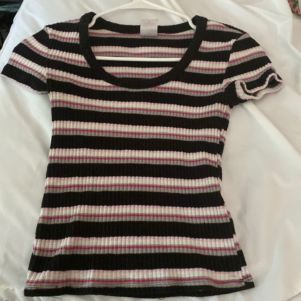 I am selling a cute shirt that is size XS. It’s in good shape.